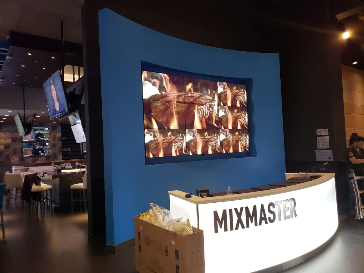 Completed multi-screen video wall in a hospitality setting