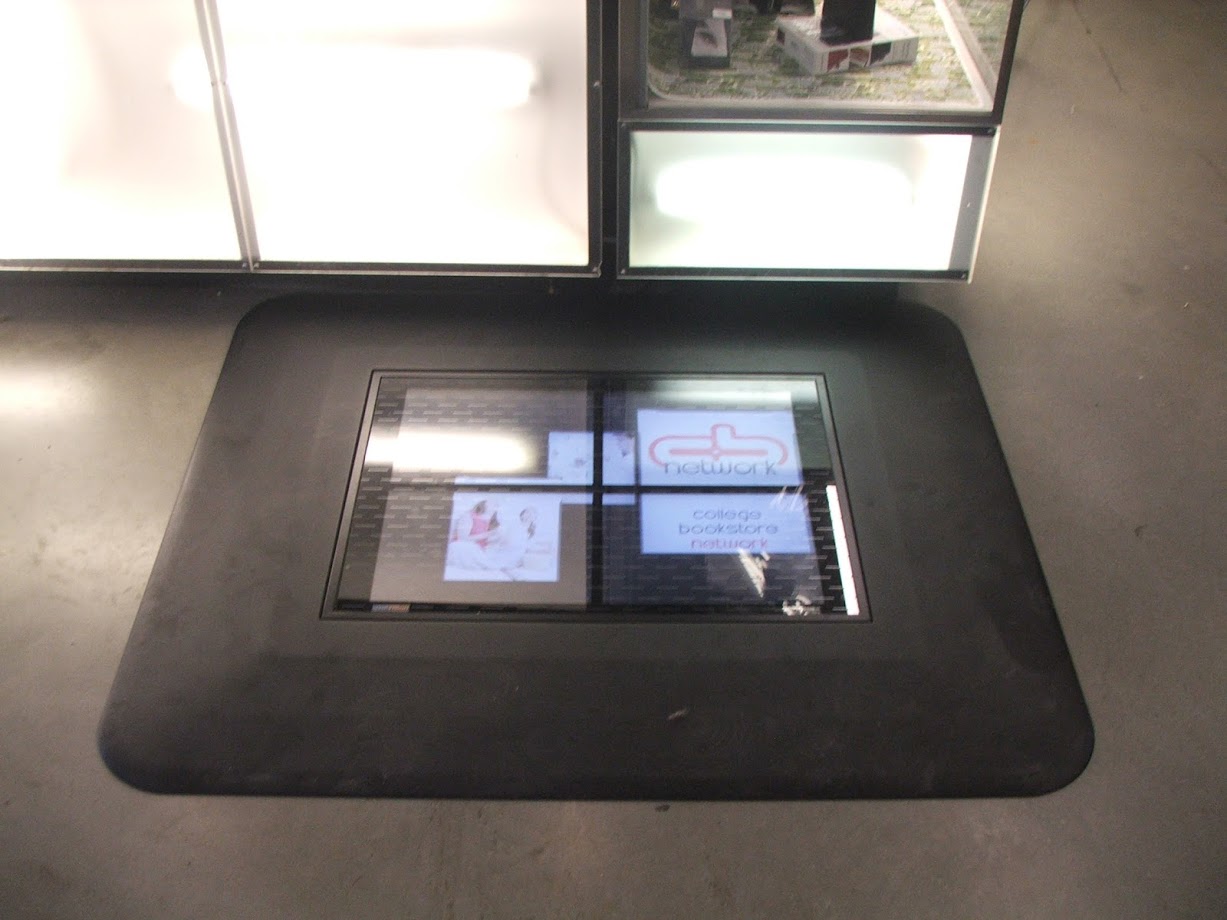 Interactive commercial display integrated into a counter