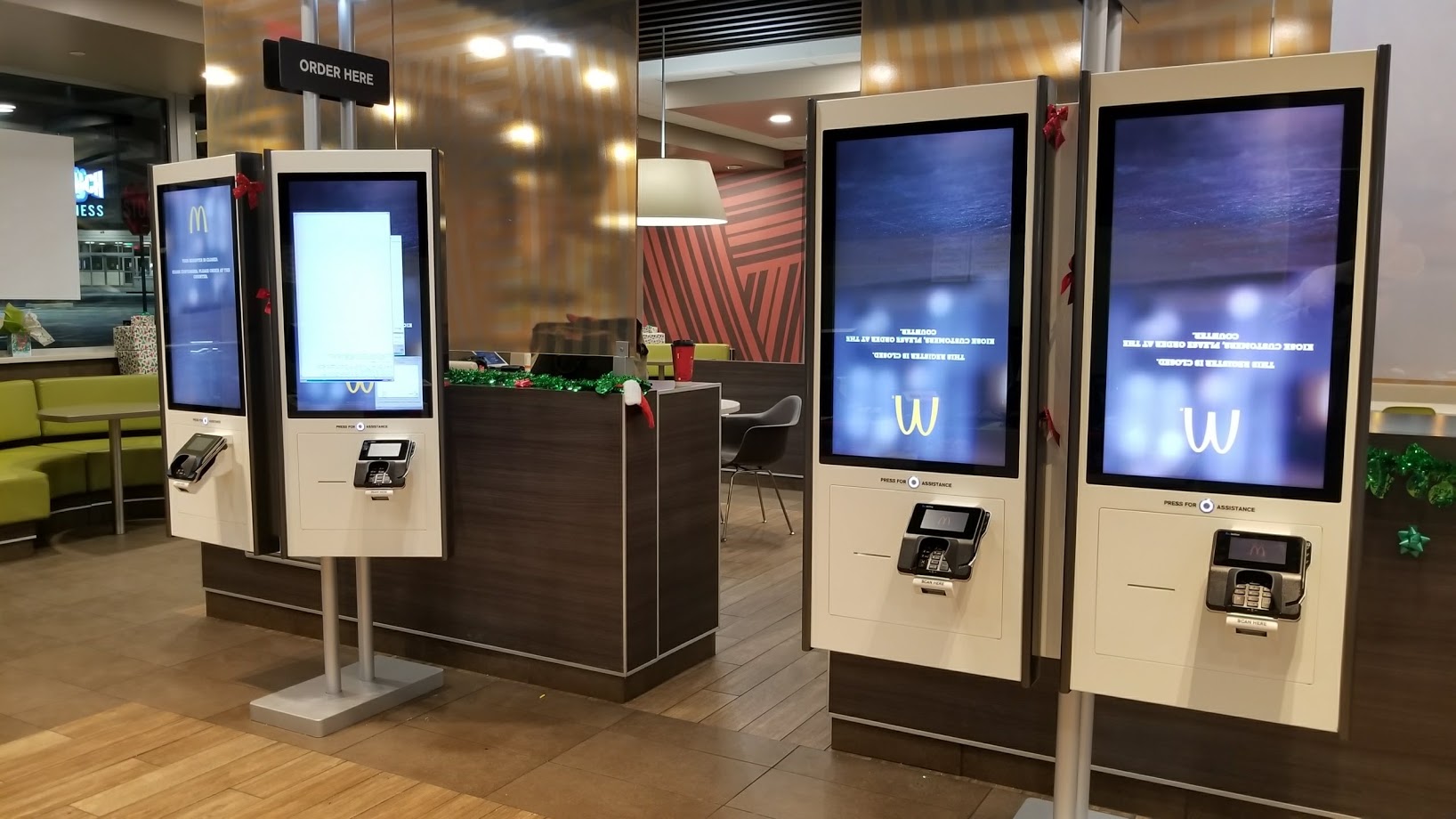 Self-service kiosks installed in a commercial restaurant